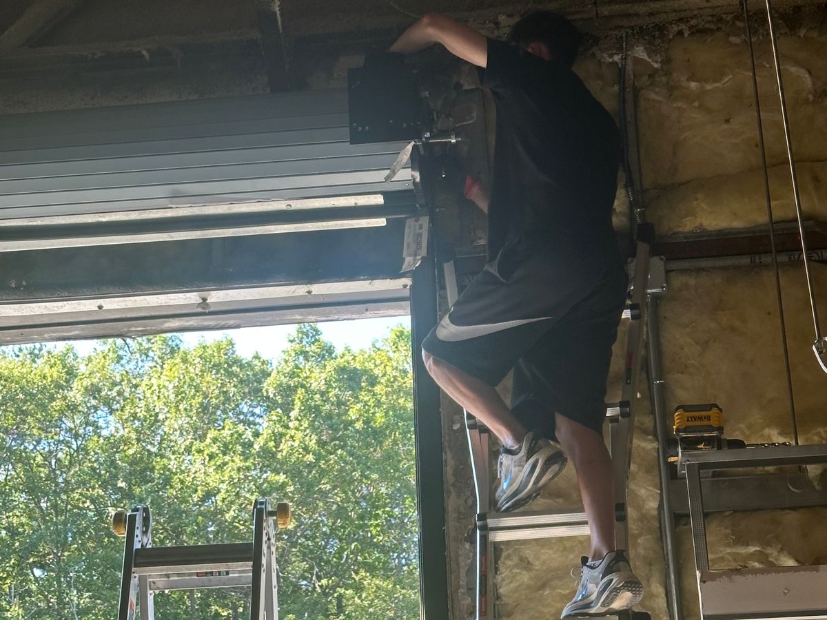 Row of commercial garage doors at storage facility in Massachusetts