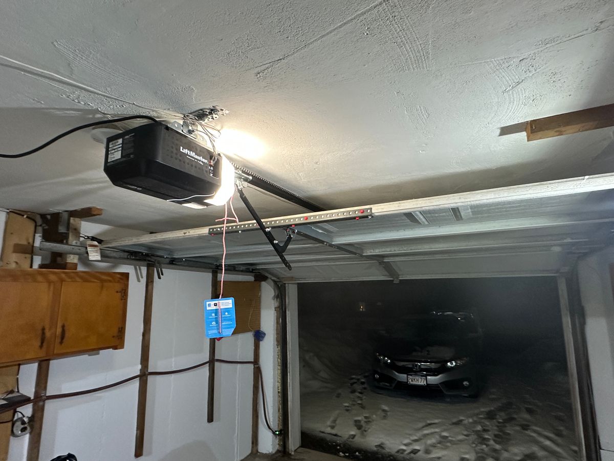 LiftMaster garage door opener with MyQ smart device installed in Massachusetts home
